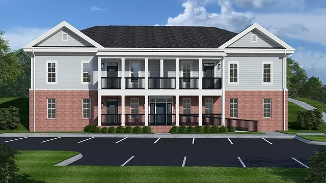 front view of a house with a yard