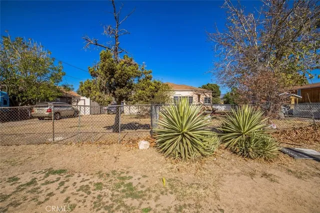 a view of a backyard of a house