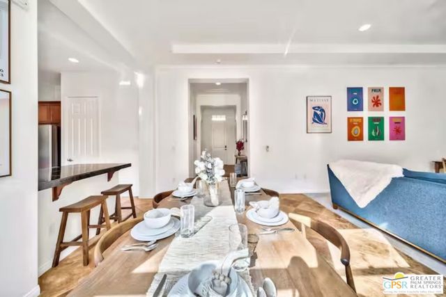 a view of a swimming pool with chairs