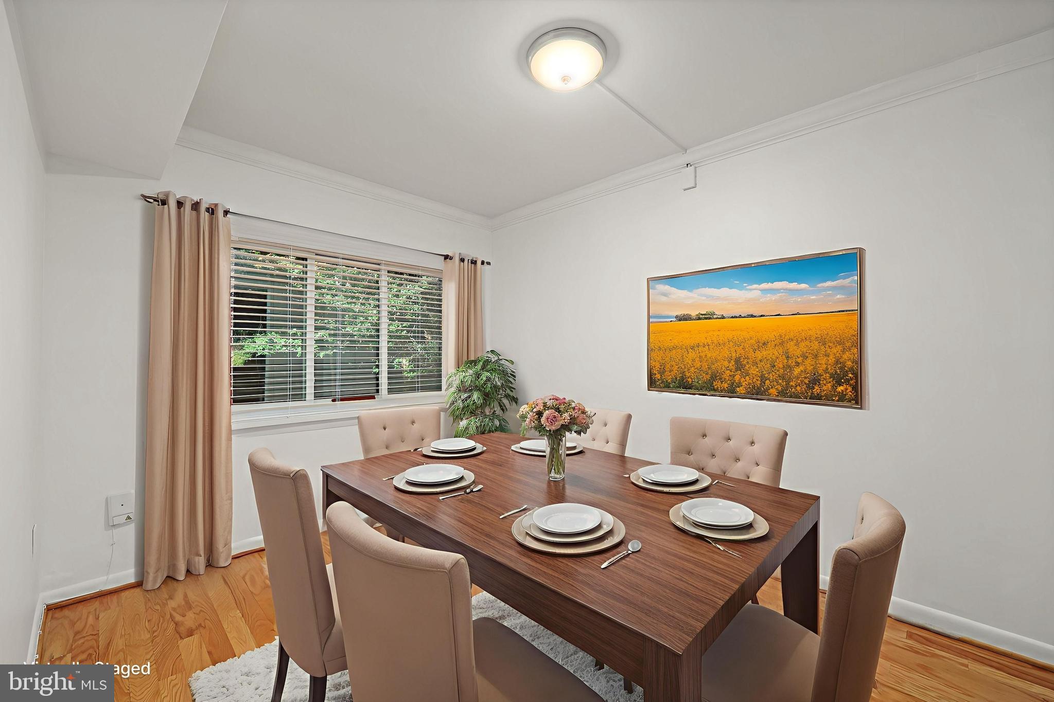11721 Karbon Hill Court, Unit T2 Reston, VA 20191 - Photo 14 of 31 a view of a dining room with furniture window and wooden floor