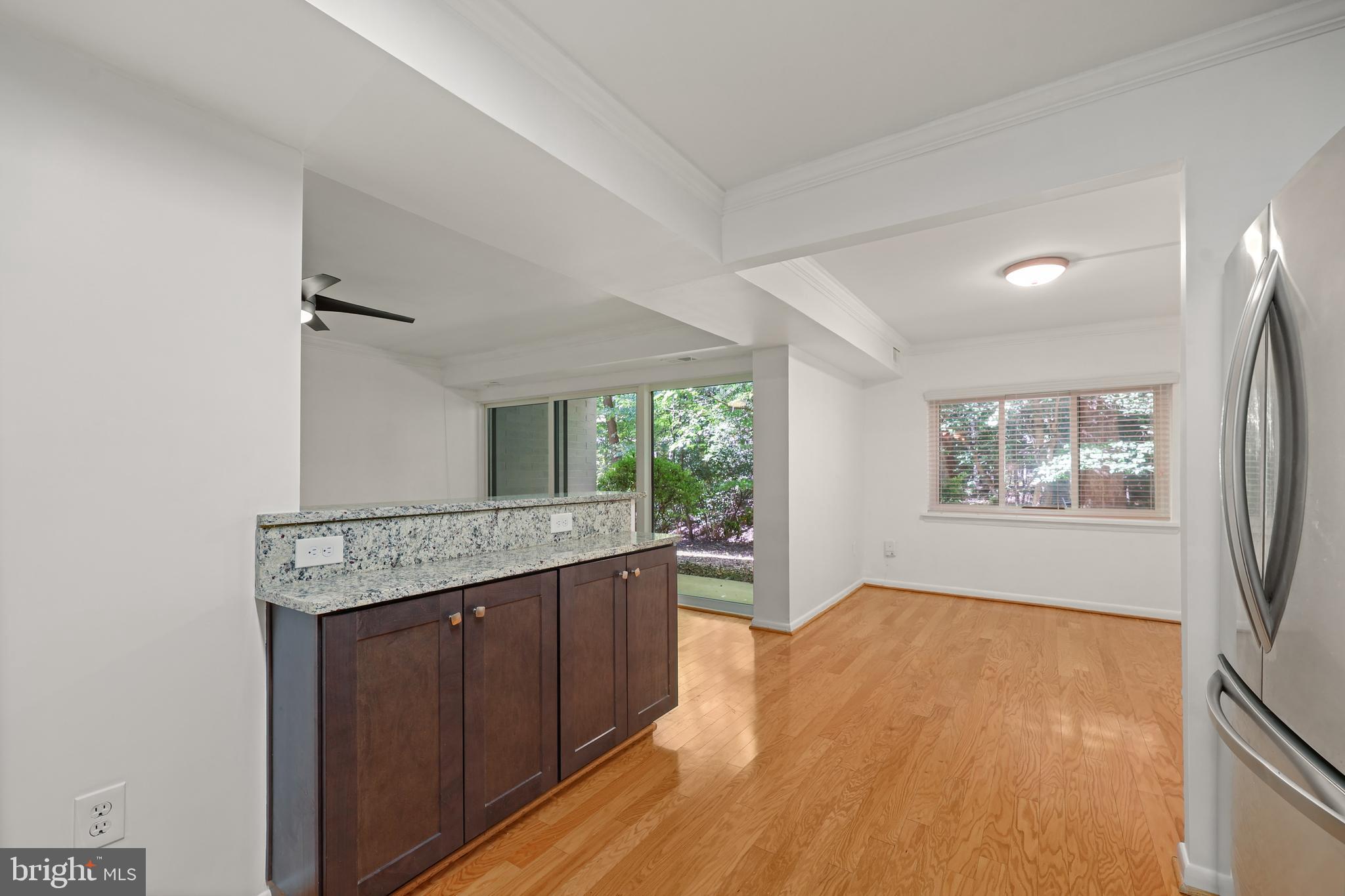 11721 Karbon Hill Court, Unit T2 Reston, VA 20191 - Photo 18 of 31 a room with a stove and a window