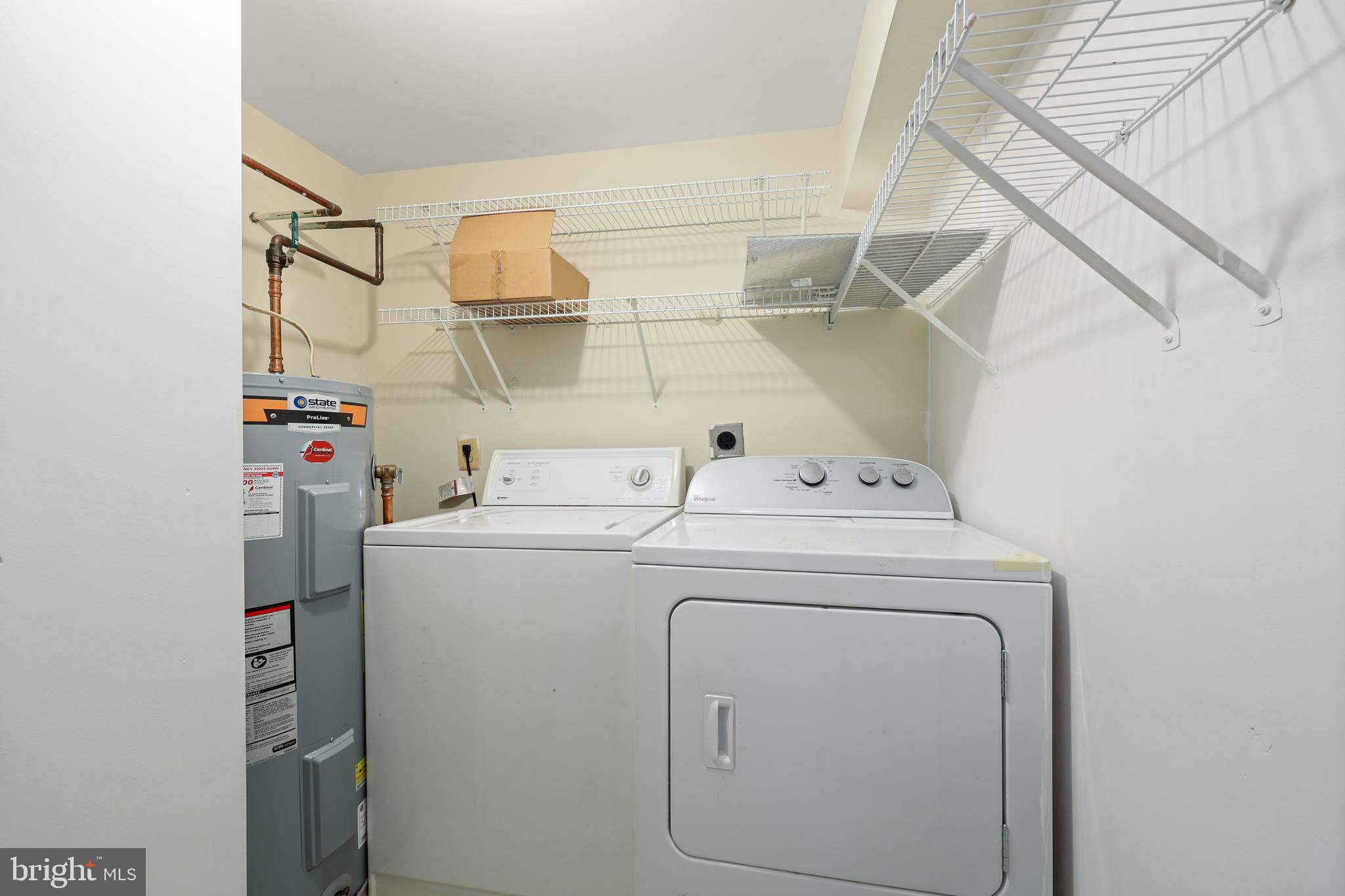 11721 Karbon Hill Court, Unit T2 Reston, VA 20191 - Photo 19 of 31 a utility room with dryer and washer