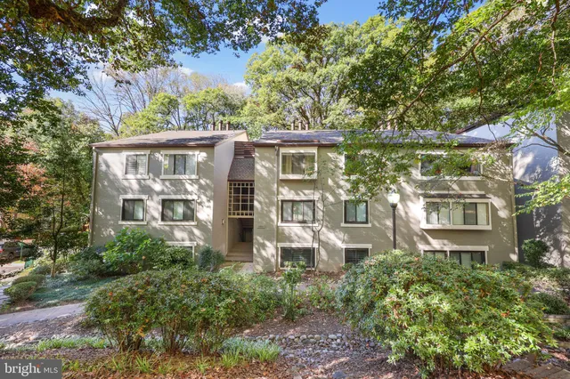 front view of a house with a garden