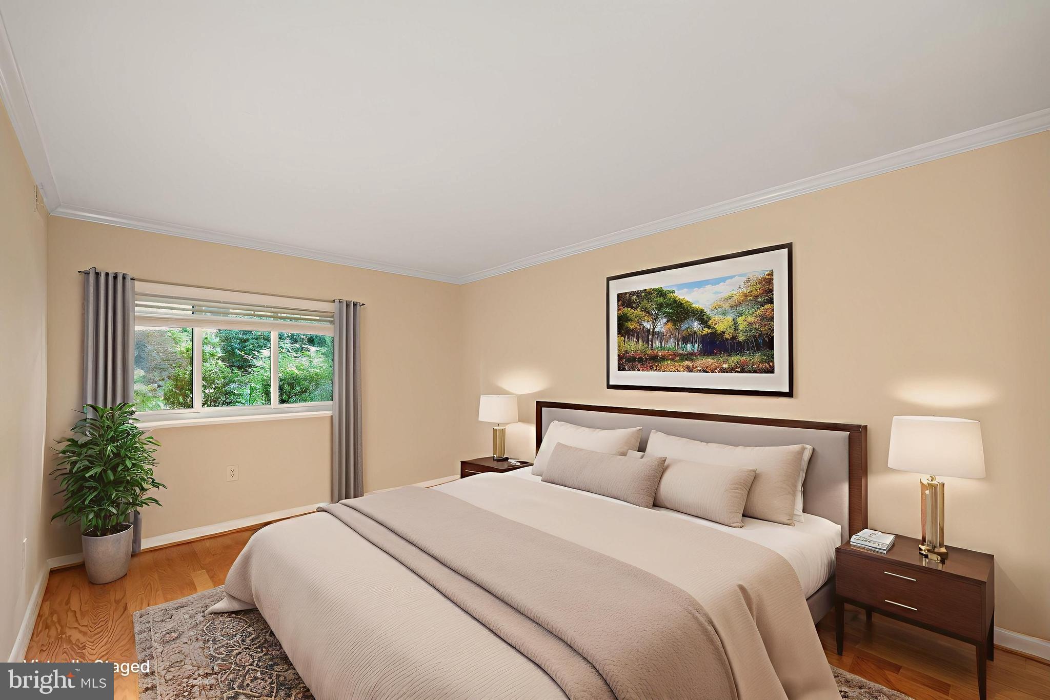 11721 Karbon Hill Court, Unit T2 Reston, VA 20191 - Photo 25 of 31 a bedroom with bed and window