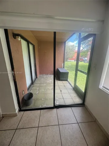 a view of an empty room and window