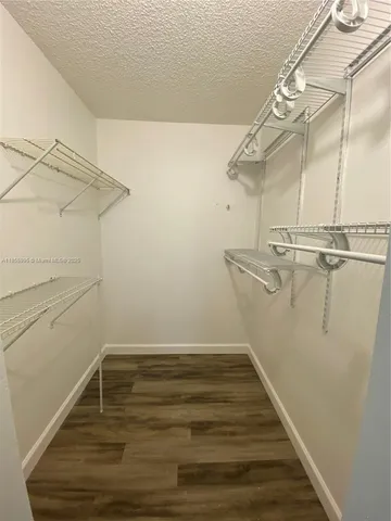 a view of a room with racks on the wall