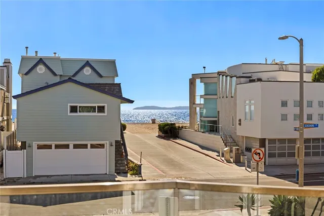 a view of a balcony with chairs