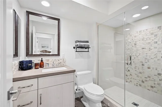 a view of a living room and a balcony