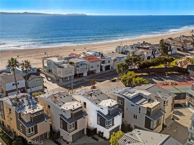 an aerial view of a building with outdoor space