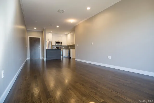a view of a kitchen and dining room