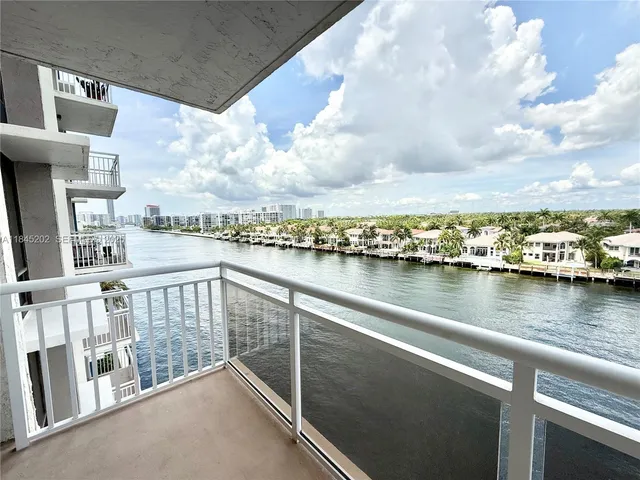 a view dining table chairs and a wooden floor
