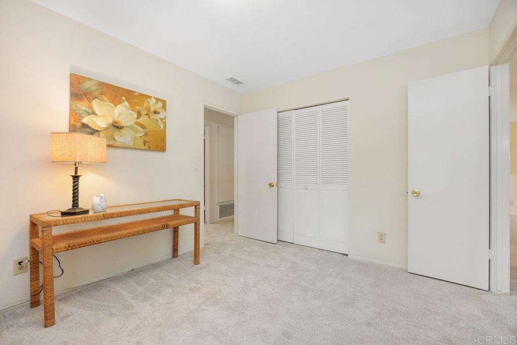 1037 Glenmere Road Vista, CA 92084 - Photo 20 of 36 a room with a table and a chair