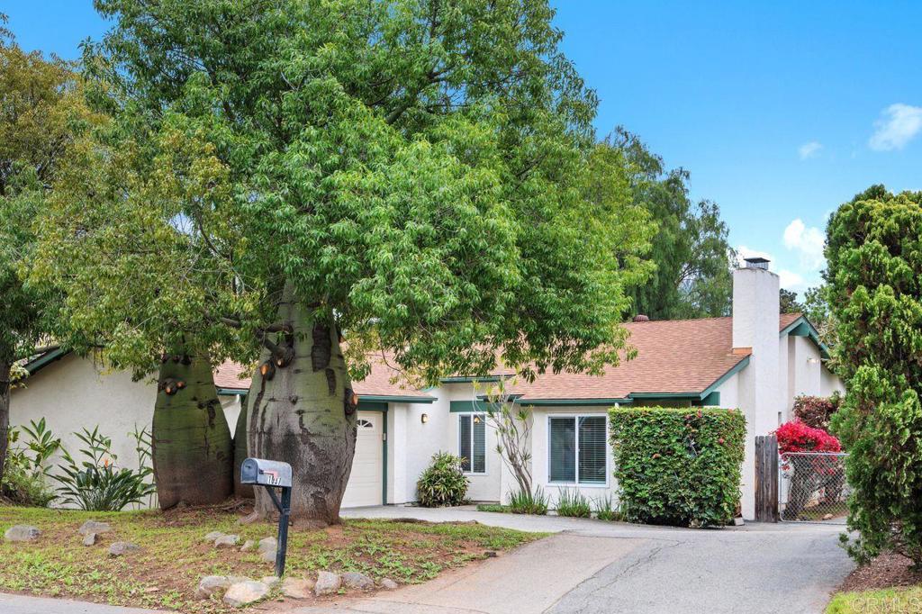 1037 Glenmere Road Vista, CA 92084 - Photo 35 of 36 a front view of a house with garden