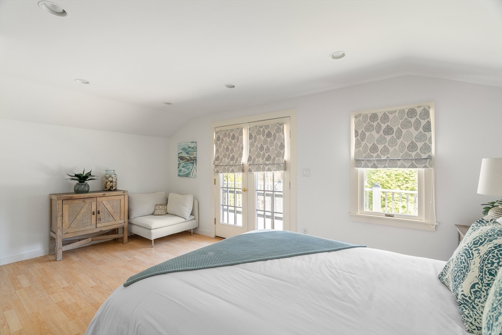 13 Young Street Edgartown, MA 02539 - Photo 10 of 29 a bedroom with a bed and a window