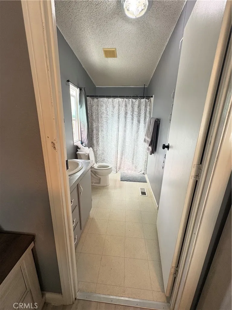 3825 Crestmore Road, Unit 414 Riverside, CA 92501 - Photo 11 of 24 a view of walk in closet with window and stairs