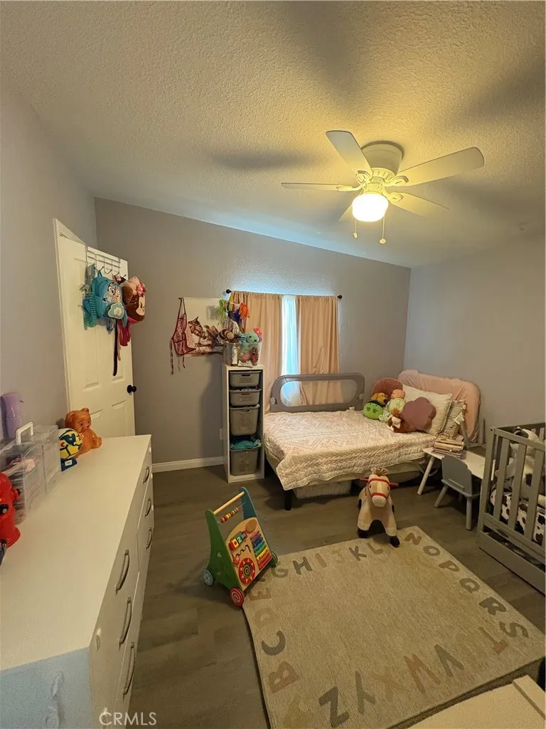 3825 Crestmore Road, Unit 414 Riverside, CA 92501 - Photo 12 of 24 a living room with furniture