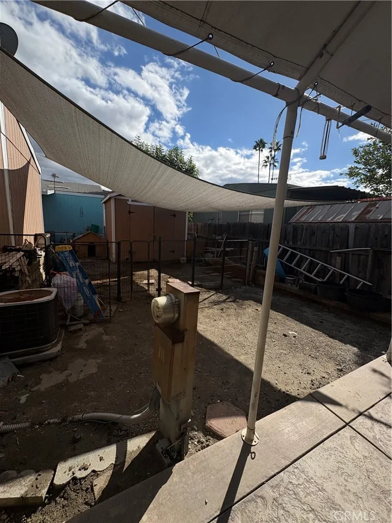 3825 Crestmore Road, Unit 414 Riverside, CA 92501 - Photo 24 of 24 a room with lots of car parked