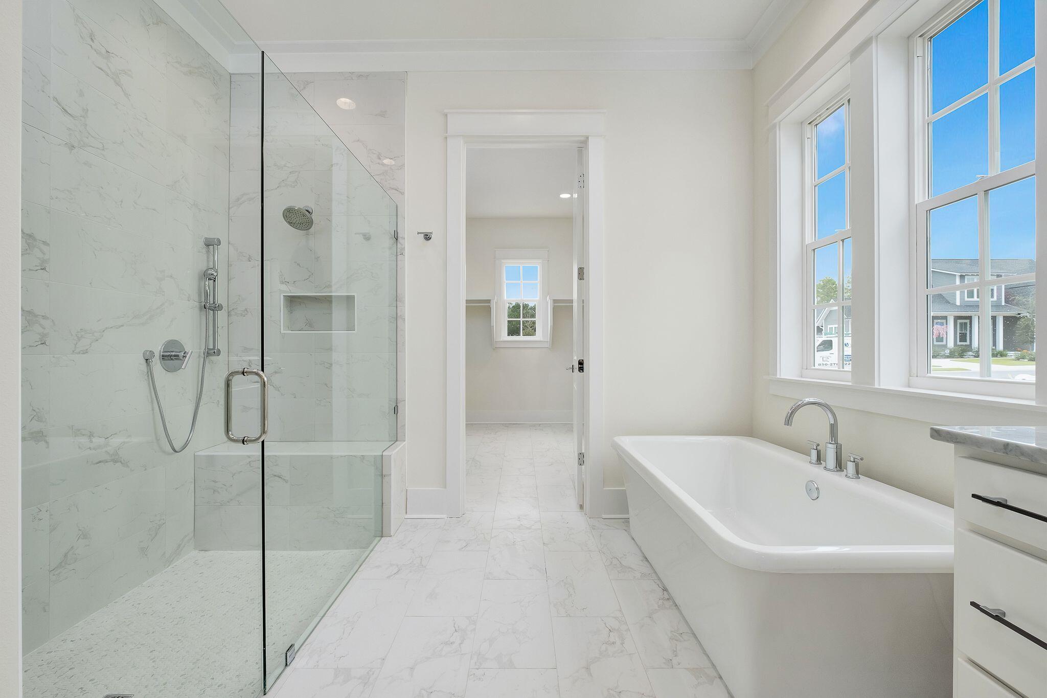 235 Needle Cast Ln Inlet Beach Inlet Beach, FL 32461 - Photo 21 of 58 a bathroom with a bathtub and shower