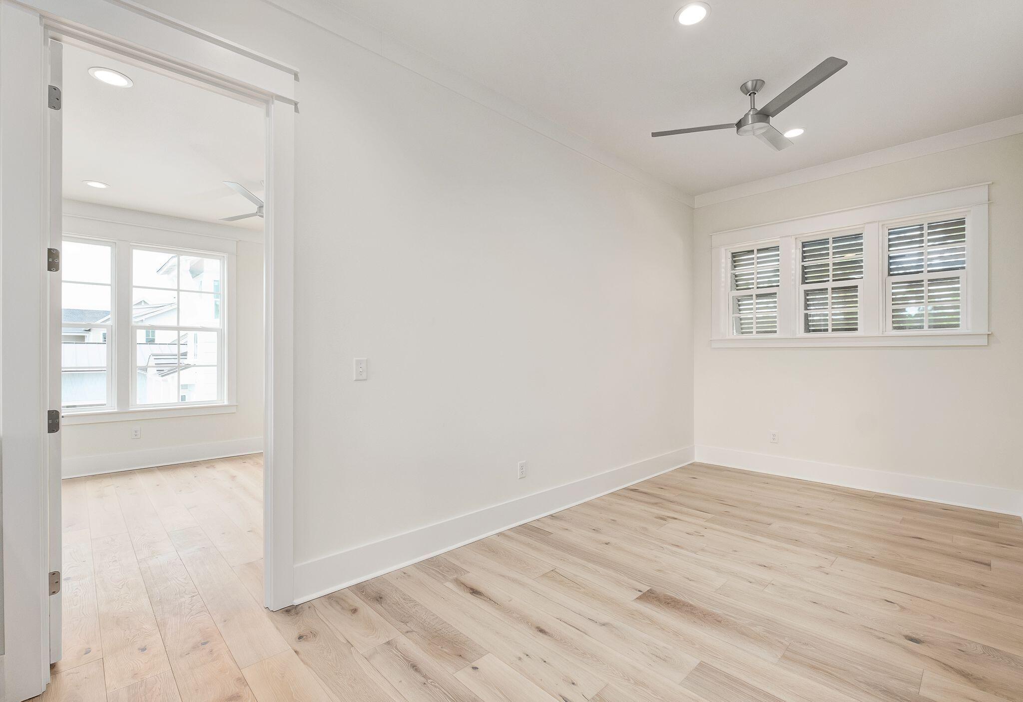 235 Needle Cast Ln Inlet Beach Inlet Beach, FL 32461 - Photo 26 of 58 wooden floor in an empty room with a window