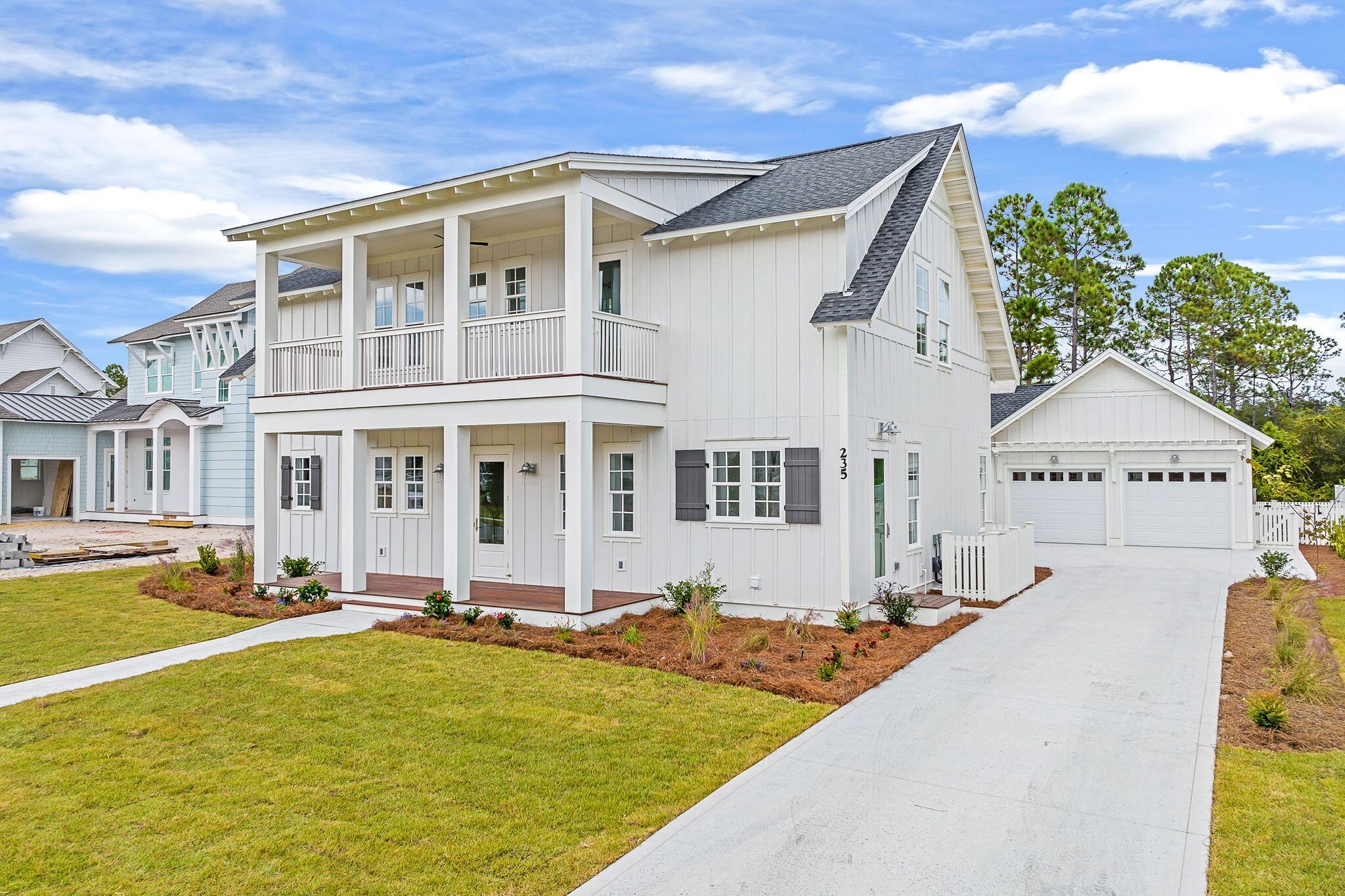235 Needle Cast Ln Inlet Beach Inlet Beach, FL 32461 - Photo 43 of 58 a front view of a house with swimming pool