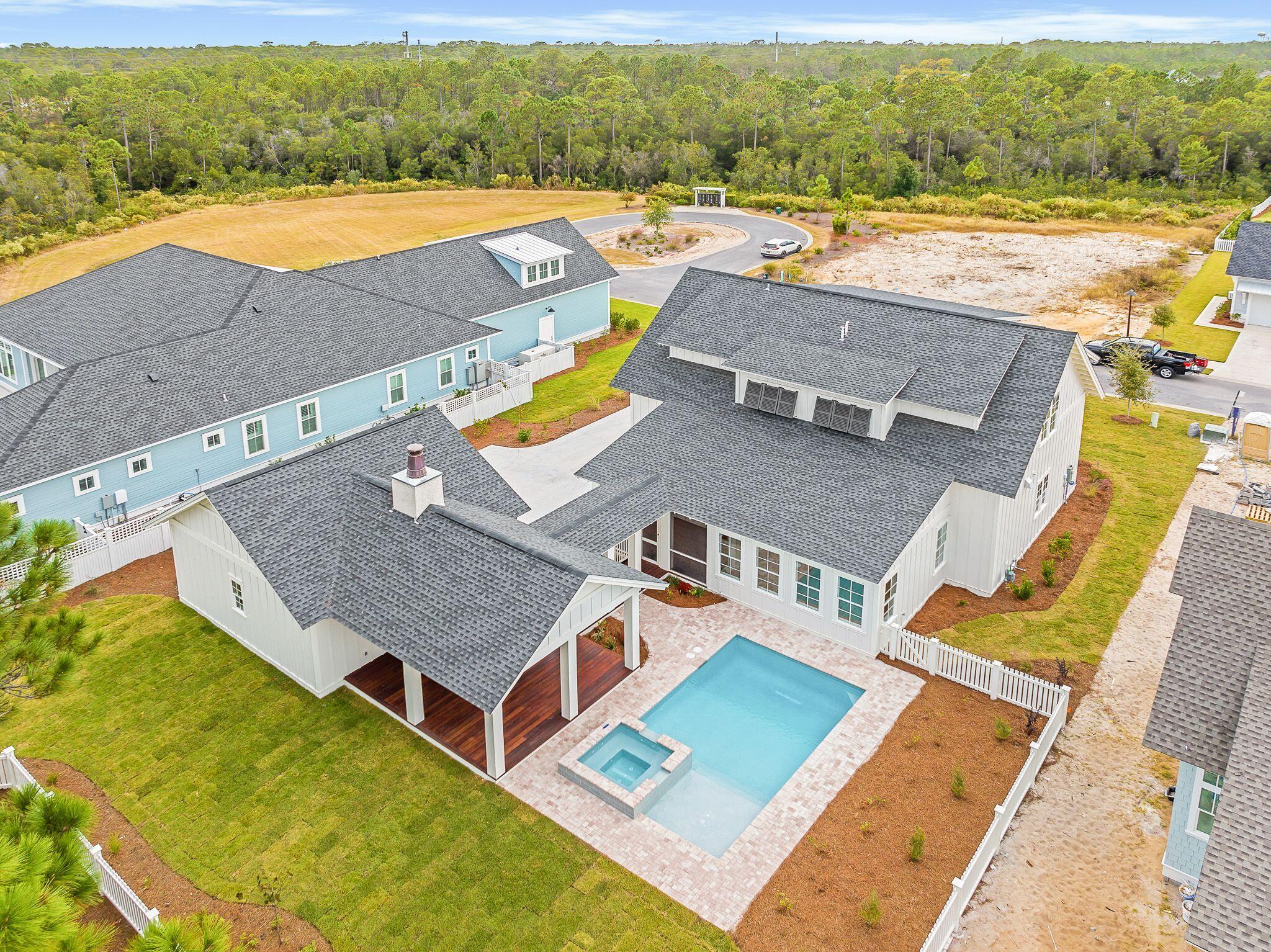 235 Needle Cast Ln Inlet Beach Inlet Beach, FL 32461 - Photo 44 of 58 an aerial view of residential houses with outdoor space