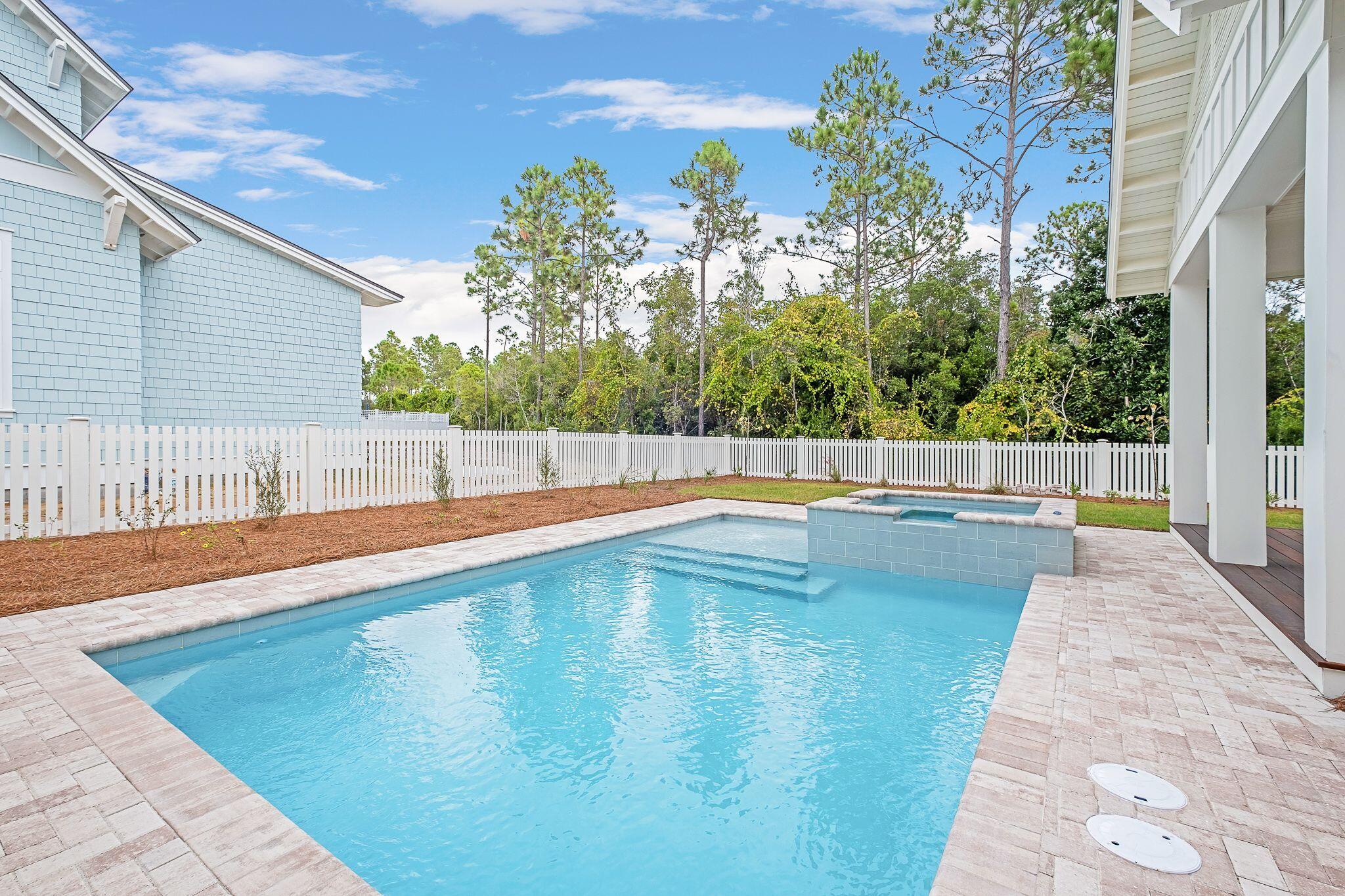 235 Needle Cast Ln Inlet Beach Inlet Beach, FL 32461 - Photo 5 of 58 a view of swimming pool with a sitting area