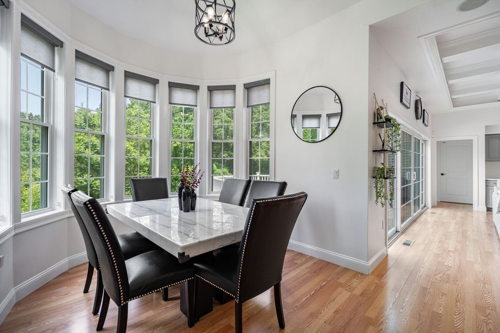 31 Cedar Street North Reading, MA 01864 - Photo 15 of 41 a view of a dining room with furniture window and wooden floor