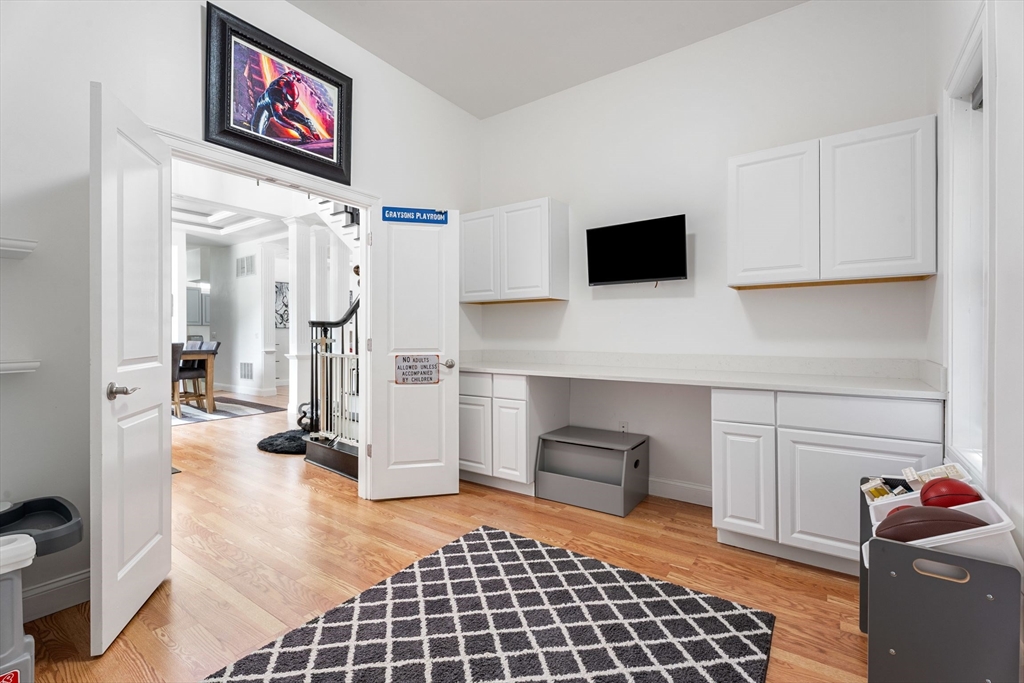 31 Cedar Street North Reading, MA 01864 - Photo 23 of 41 a room with furniture and a fireplace