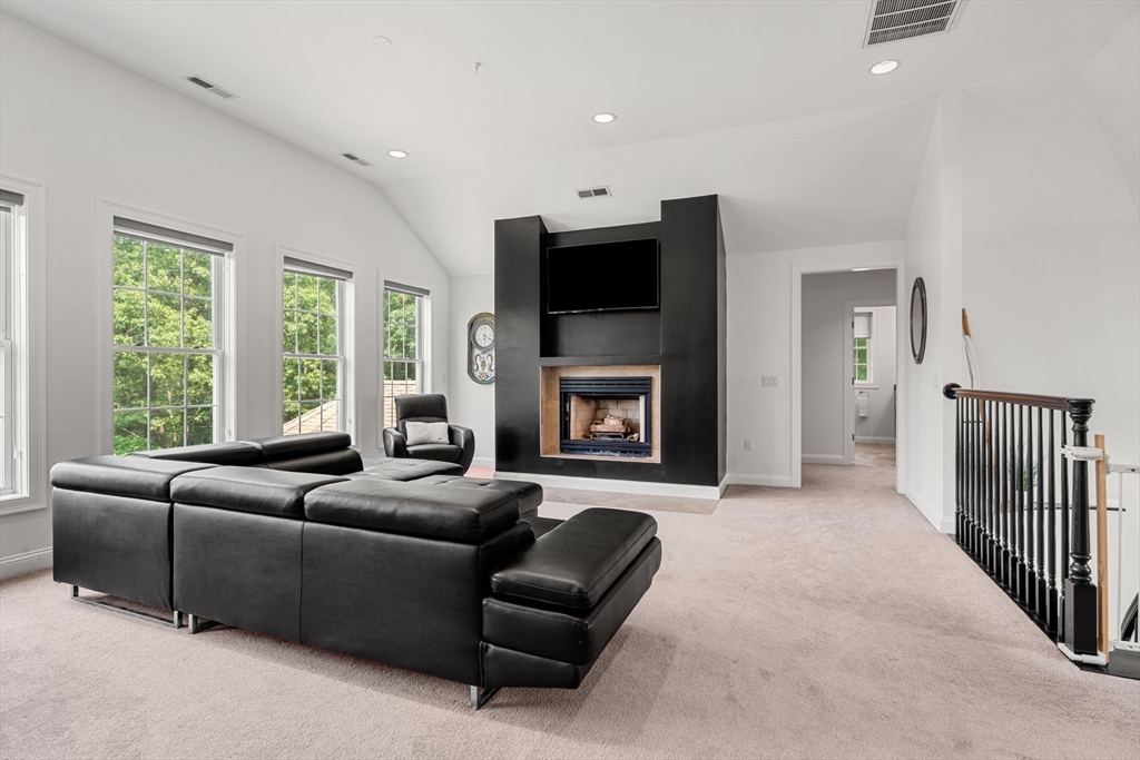 31 Cedar Street North Reading, MA 01864 - Photo 25 of 41 a living room with furniture window and a fireplace