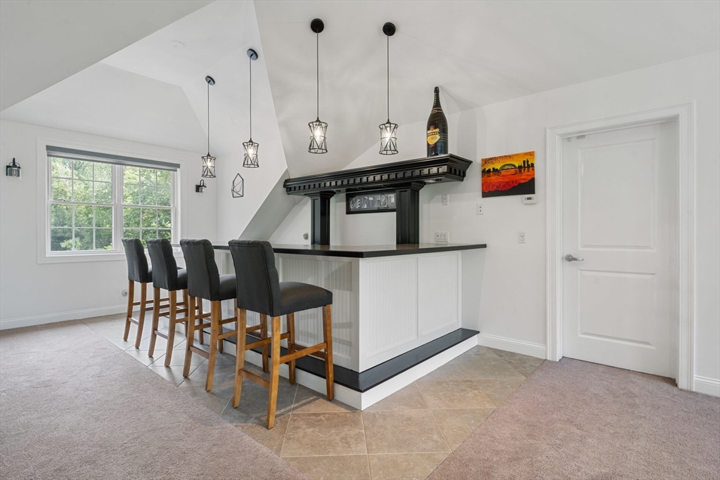31 Cedar Street North Reading, MA 01864 - Photo 28 of 41 a view of a room with furniture and window