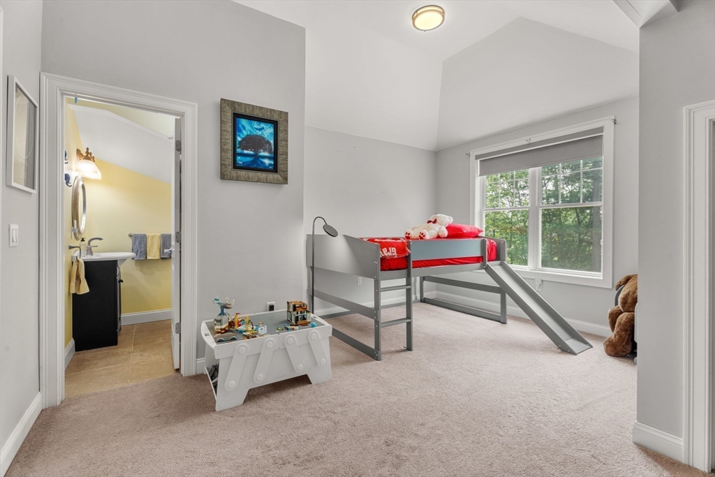 31 Cedar Street North Reading, MA 01864 - Photo 29 of 41 a bedroom with furniture and a window