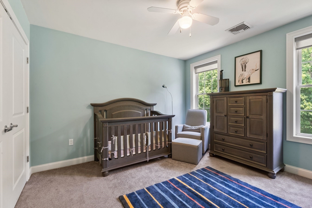 31 Cedar Street North Reading, MA 01864 - Photo 32 of 41 a bedroom with furniture and a window