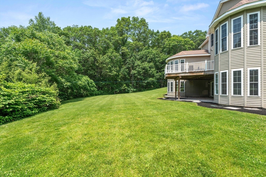 31 Cedar Street North Reading, MA 01864 - Photo 34 of 41 a view of a house with backyard and garden
