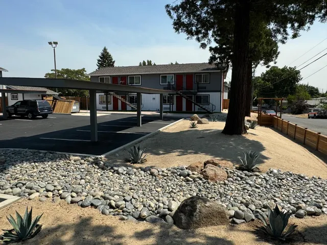 a view of a terrace with wooden fence