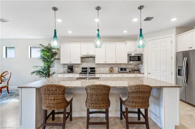 $9,995 | 7611 Winding Cypress Drive, Naples, FL 34114