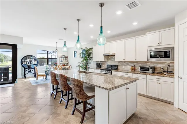 $9,995 | 7611 Winding Cypress Drive, Naples, FL 34114