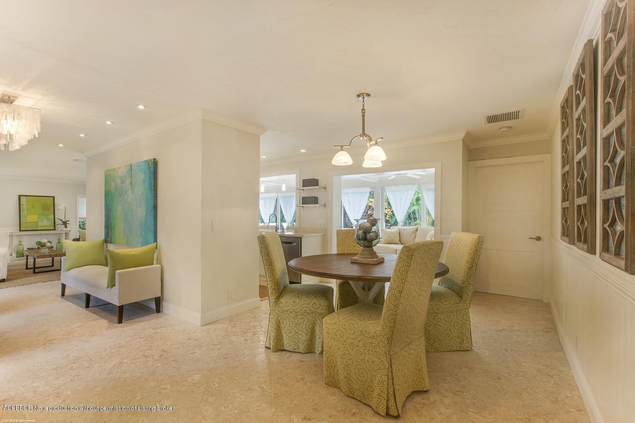 11 Ridge Boulevard Ocean Ridge, FL 33435 - Photo 9 of 26 a view of a dining room with furniture