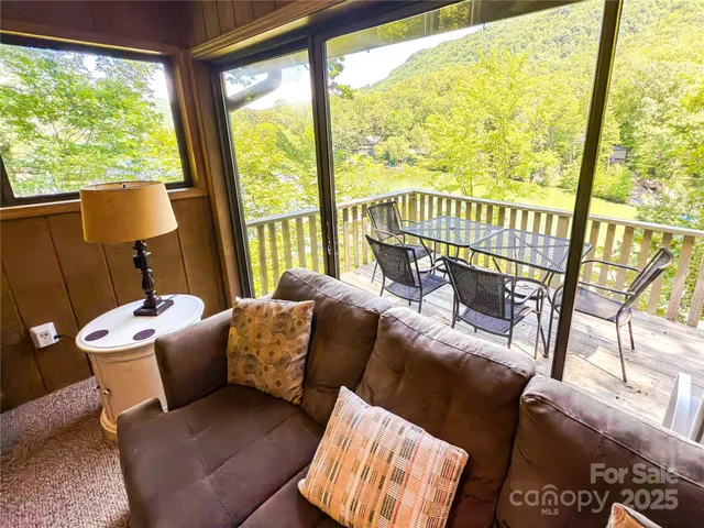 a view of a balcony with an outdoor space