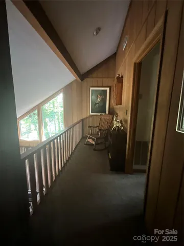 a view of a backyard with swimming pool