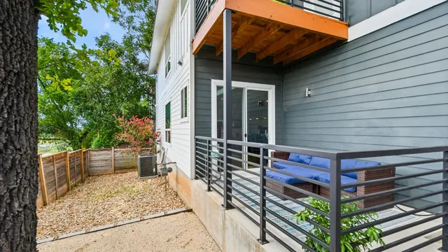 a view of a backyard with sitting area