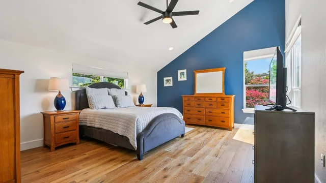 a bed room with a bed and window