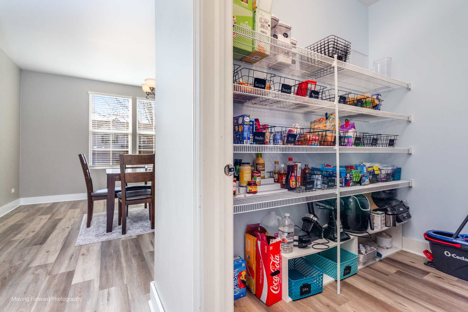25420 Springview Court Plainfield, IL 60586 - Photo 5 of 26 a workspace with furniture and a book shelf