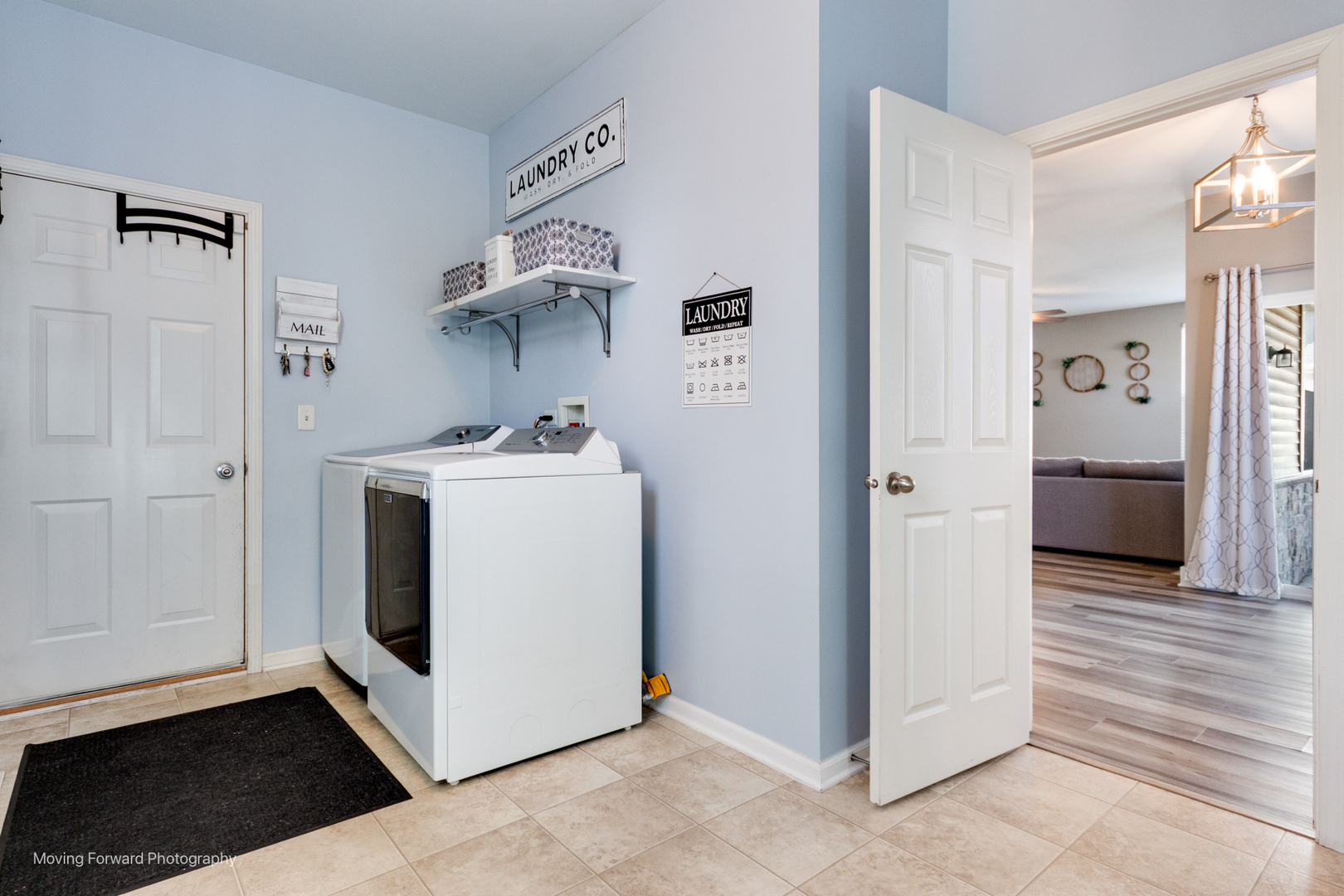25420 Springview Court Plainfield, IL 60586 - Photo 8 of 26 a utility room with cabinets washer and dryer