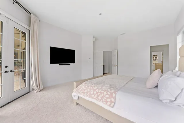 a bathroom with a granite countertop sink a mirror a shower and a bathtub
