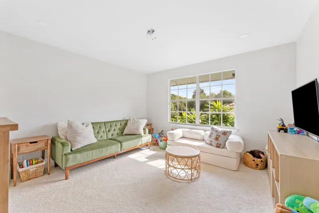 a view of a workspace with furniture