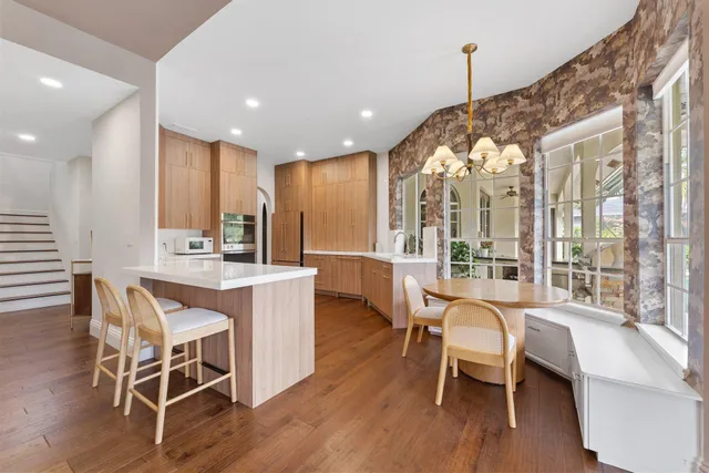 a view of a chairs and table in the patio