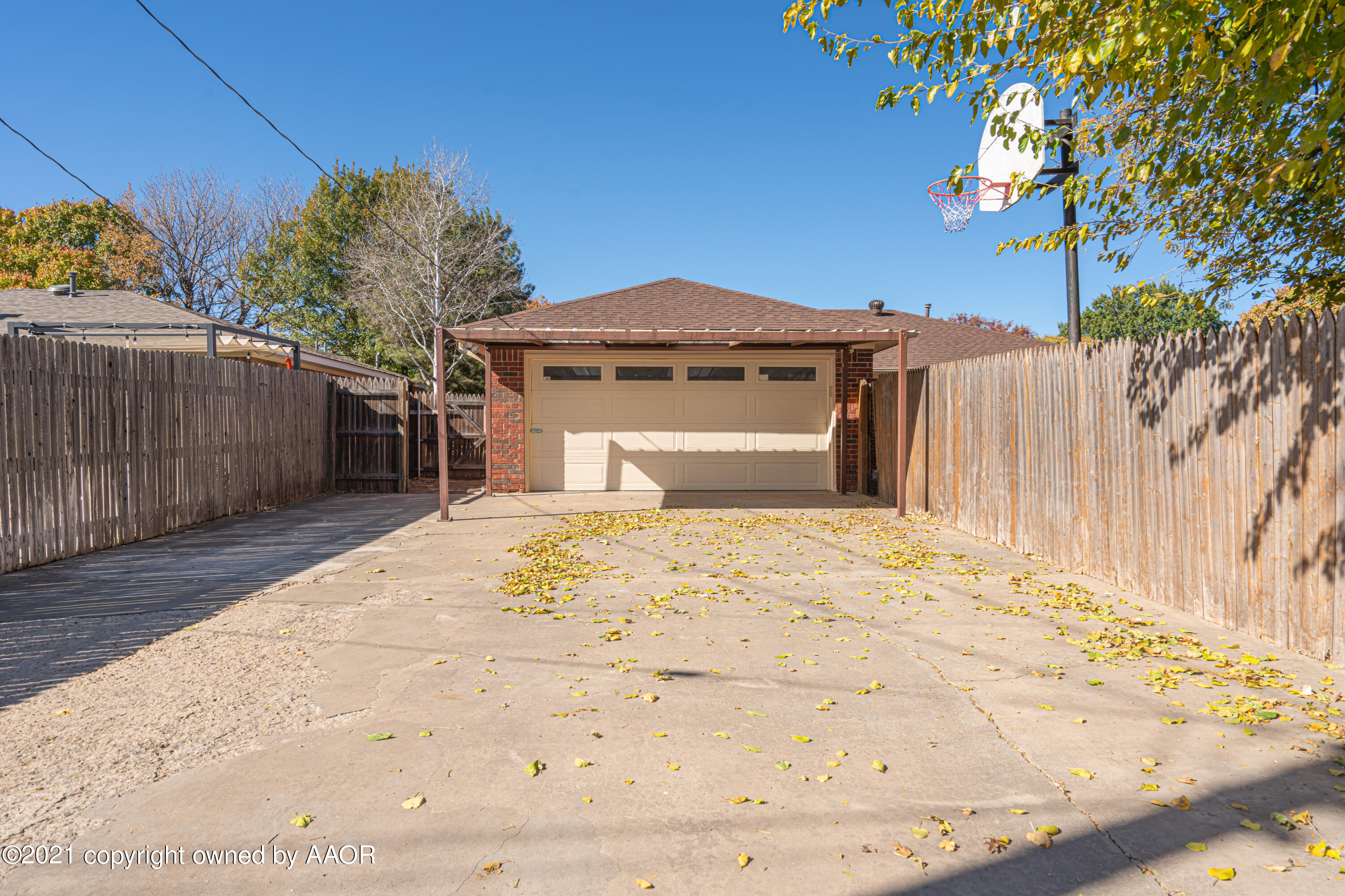 5811 Hardwick Drive Amarillo, TX 79109 - Photo 24 of 24 a front view of a house with a yard