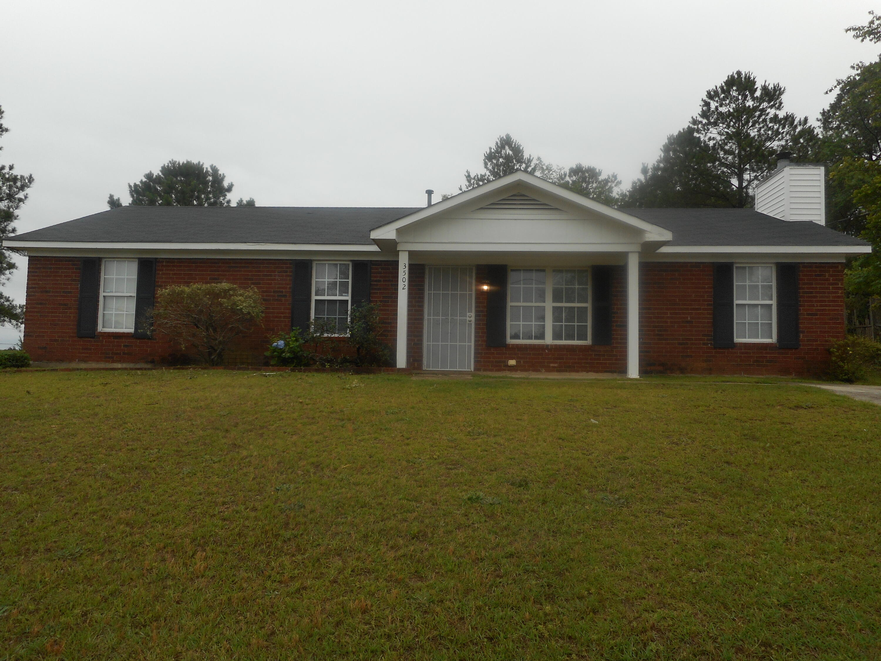 Cul de Sac, corner lot with brick exterior.