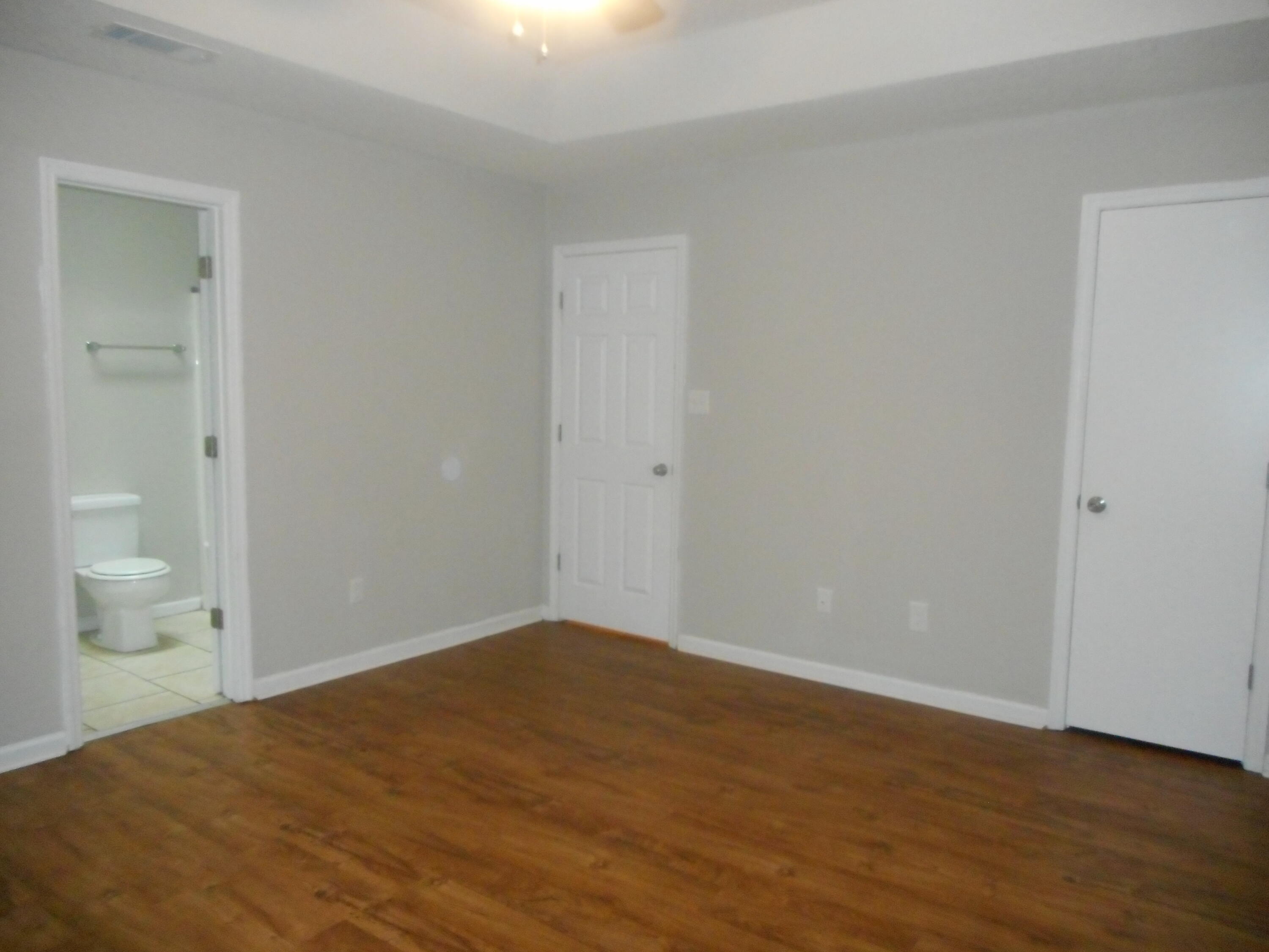 3502 Sidesaddle Court Hephzibah, GA 30815 - Photo 22 of 25 Owner suite with walk-in closet, ceiling fan and private bath.