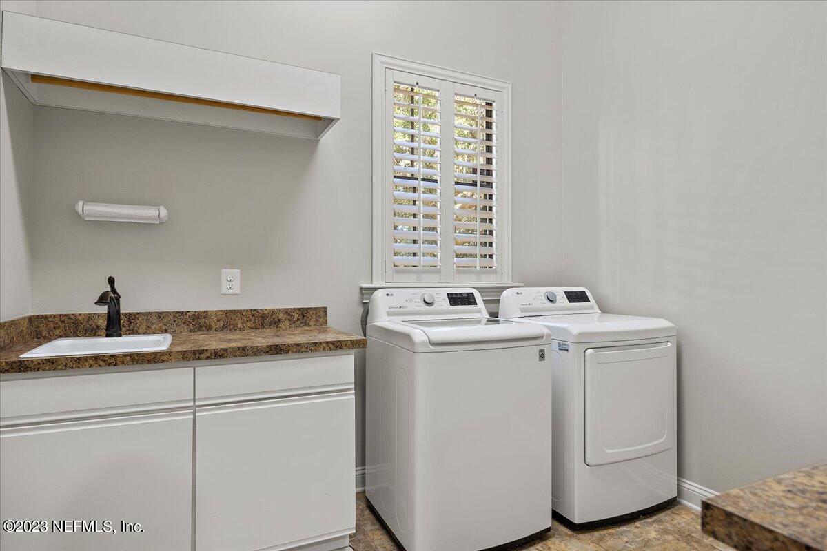 142 Marshall Creek Drive St. Augustine, FL 32095 - Photo 39 of 61 a utility room with dryer and washer